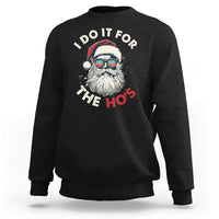 Black Christmas sweatshirt with Santa graphic and “I Do It For The Ho’s” text on chest