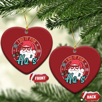 Set of two red heart Christmas ornaments with Santa graphic and 'I Do It For the Ho's' text