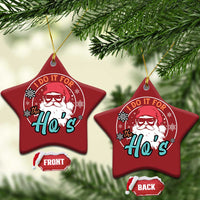Two red star-shaped Christmas ornaments with Santa portrait and 'I Do It For the Ho's' lettering