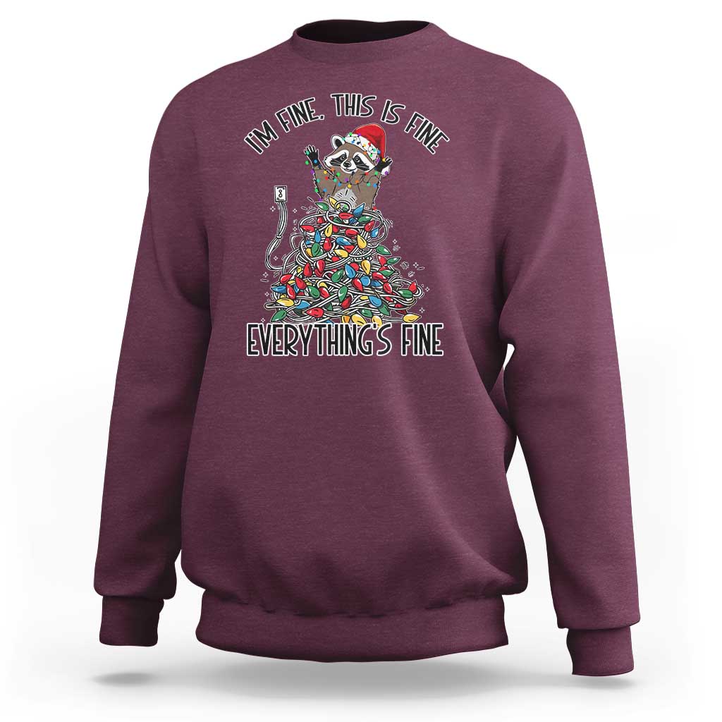 Maroon Christmas raccoon sweatshirt with holiday lights graphic, "Everything's Fine"