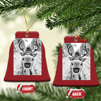 Red bell-shaped Christmas ornament with selfie-style reindeer photo and hanging loop