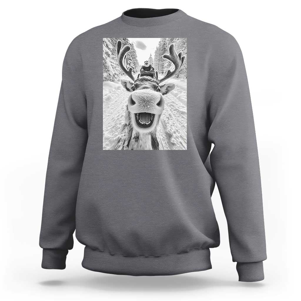 Charcoal gray crewneck sweatshirt with grayscale reindeer graphic on chest