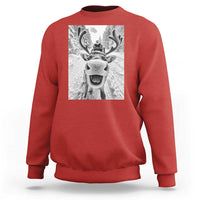Red crewneck sweatshirt with grayscale reindeer graphic on chest