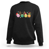 Black crewneck sweatshirt with long sleeves and colorful pickleball Christmas graphic
