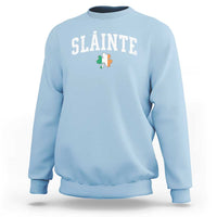 Men's crewneck sweatshirt, light blue, 'SLAINTE' shamrock graphic on front