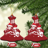 Red Christmas tree-shaped ornament with “BELIEVE” and alien and Bigfoot design