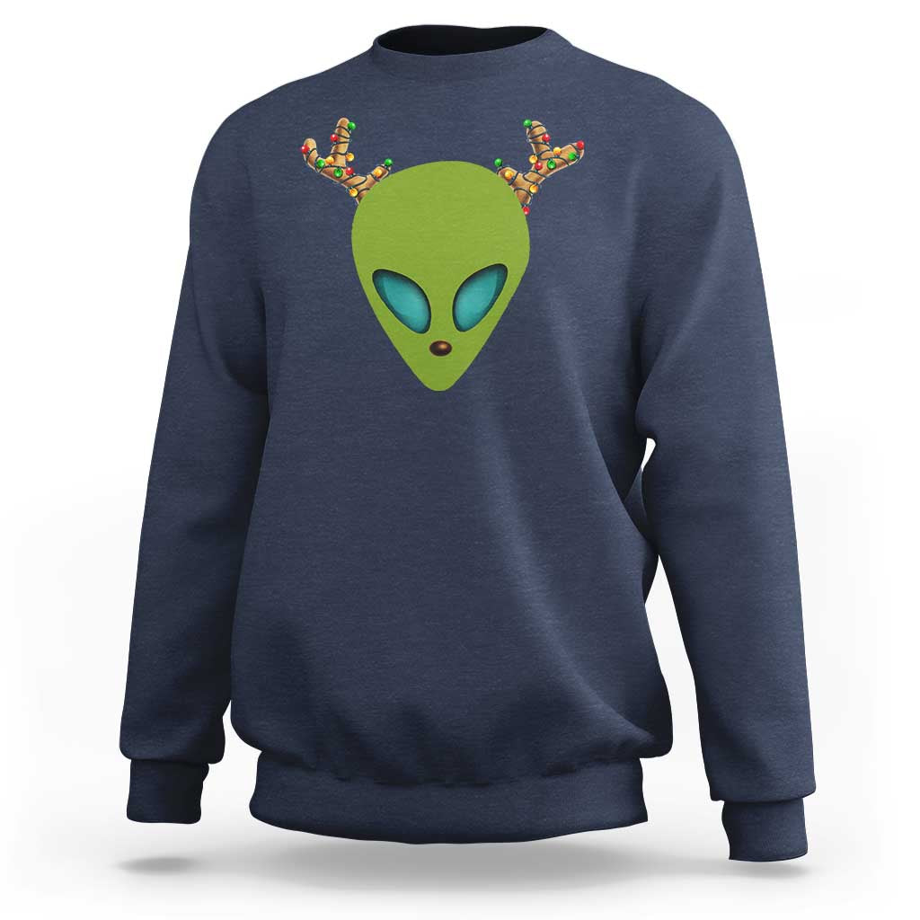 Navy crewneck sweatshirt with alien face graphic on back