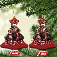 Two red bell-shaped hanging ornaments with Big Nick Energy text and bearded Santas