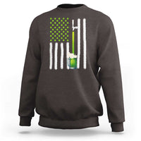 Dark chocolate sweatshirt with green shamrock dots, beer mug graphic, and white striped flag design