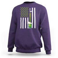 Purple sweatshirt with green shamrock dots, beer mug graphic, and white striped flag design