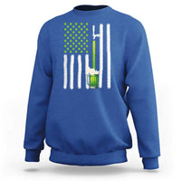Royal blue sweatshirt with green shamrock dots, beer mug graphic, and white striped flag design
