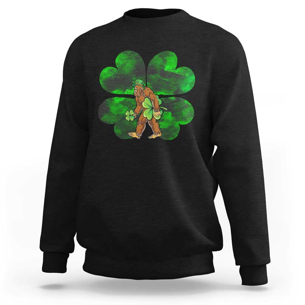 Black crewneck sweatshirt with green shamrock Bigfoot graphic on front