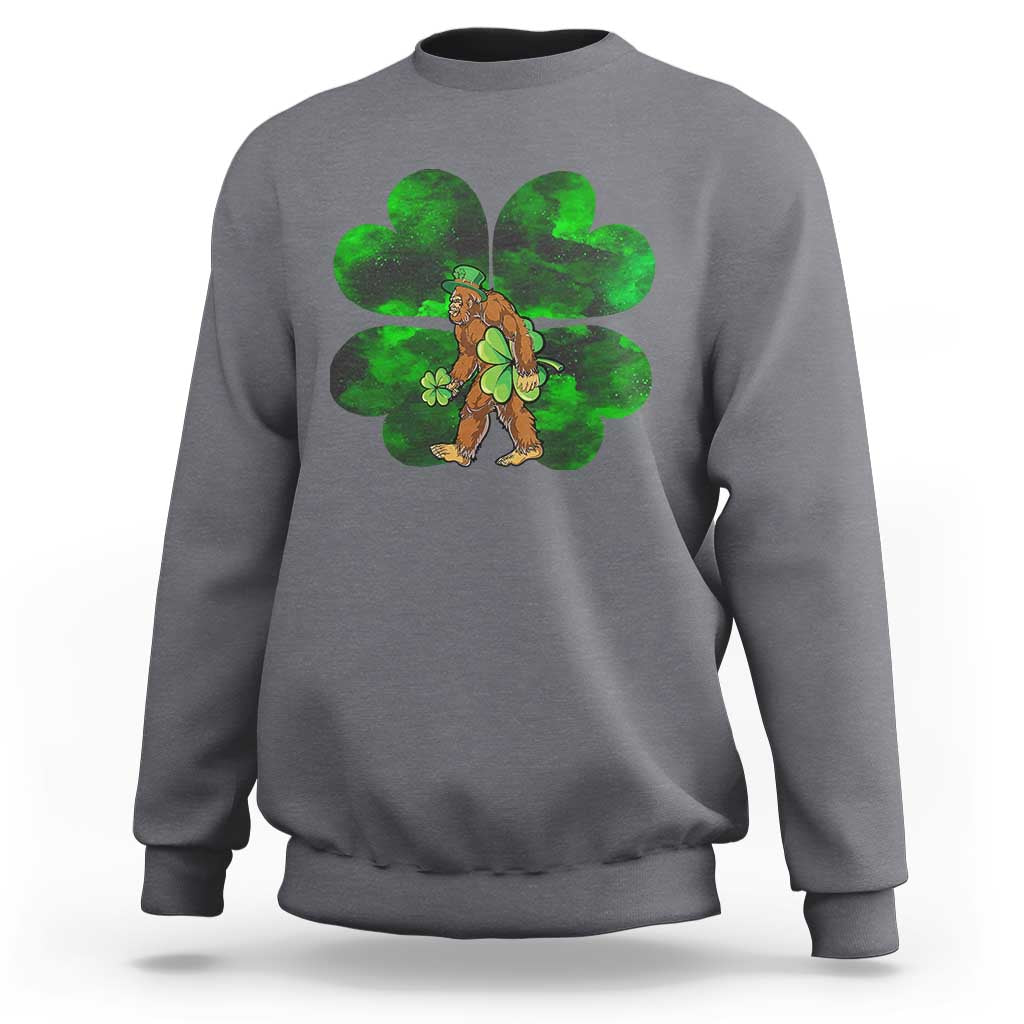 Charcoal gray crewneck sweatshirt with green shamrock Bigfoot graphic on front