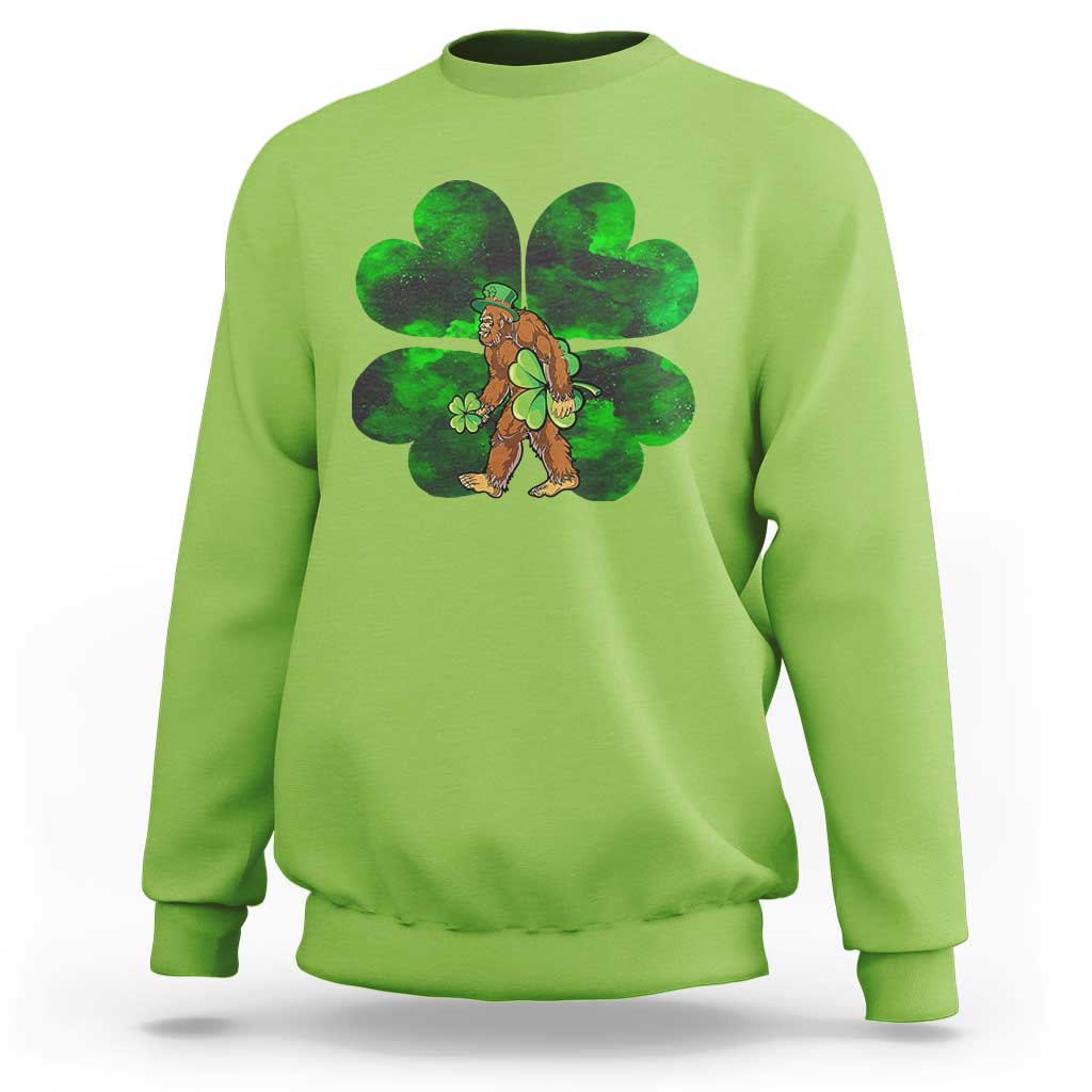 Light green crewneck sweatshirt with green shamrock Bigfoot graphic on front