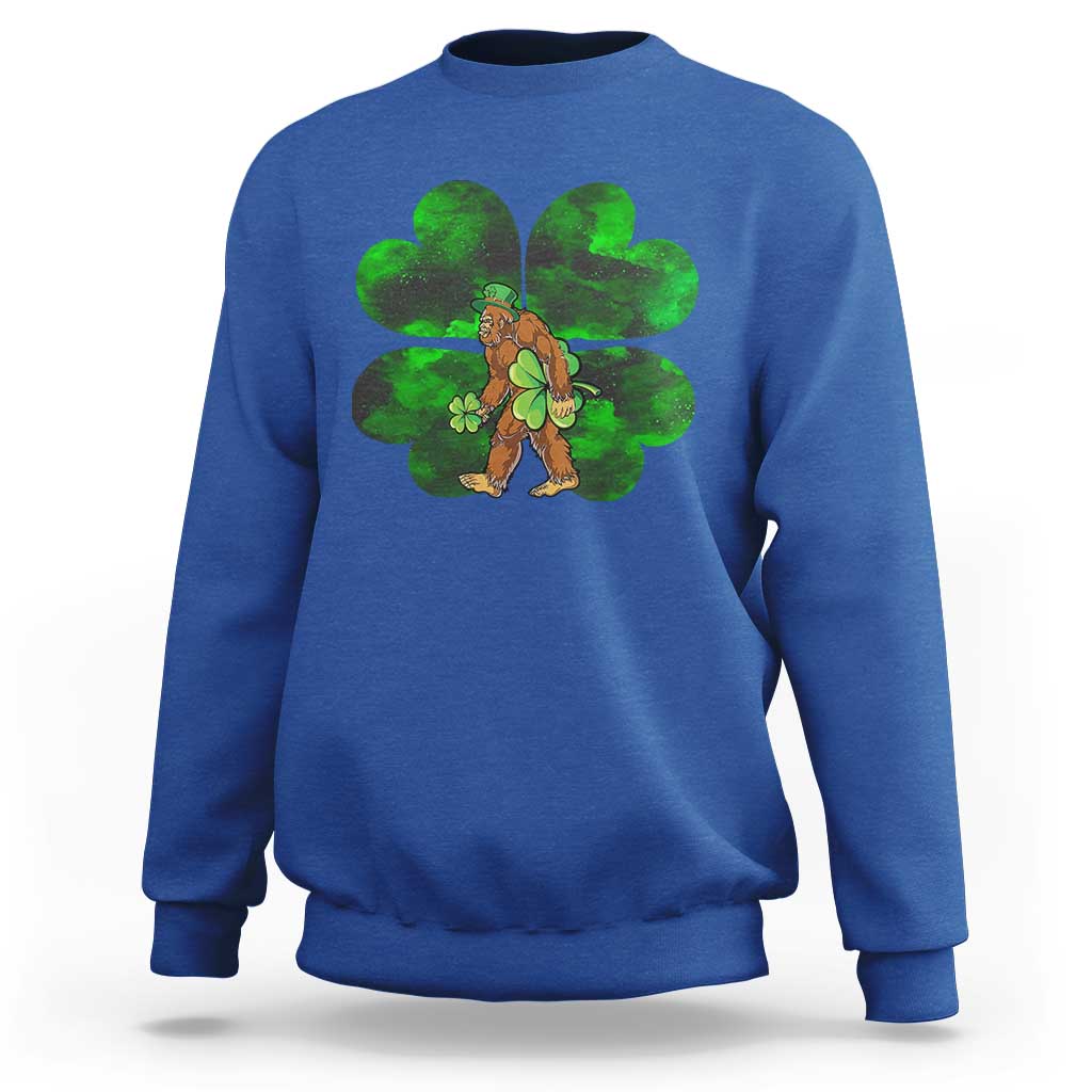 Royal blue crewneck sweatshirt with green shamrock Bigfoot graphic on front