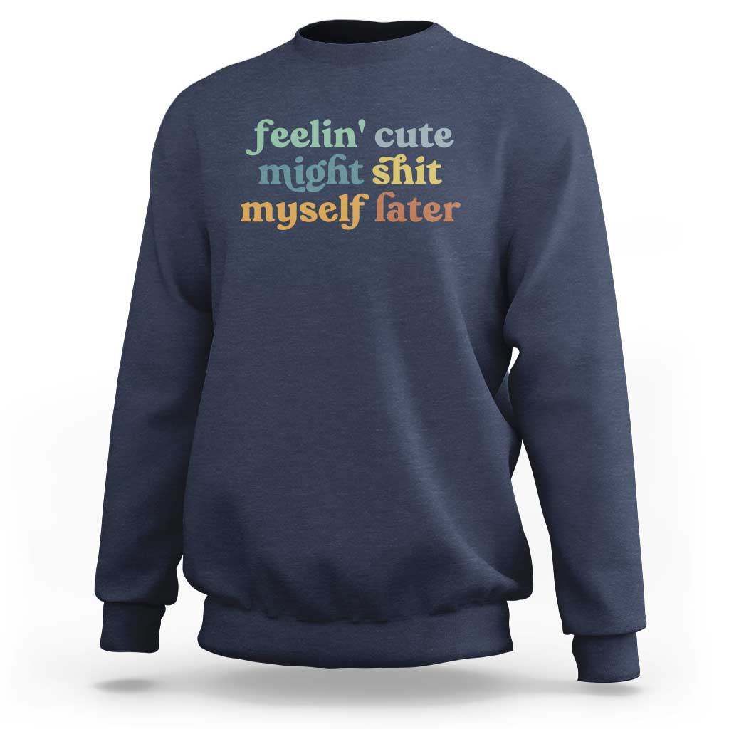 Navy sweatshirt with front graphic text in green and orange