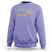 Violet sweatshirt with front graphic text in green and orange