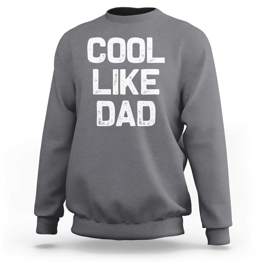 Charcoal gray kids sweatshirt with "COOL LIKE DAD" graphic text on front