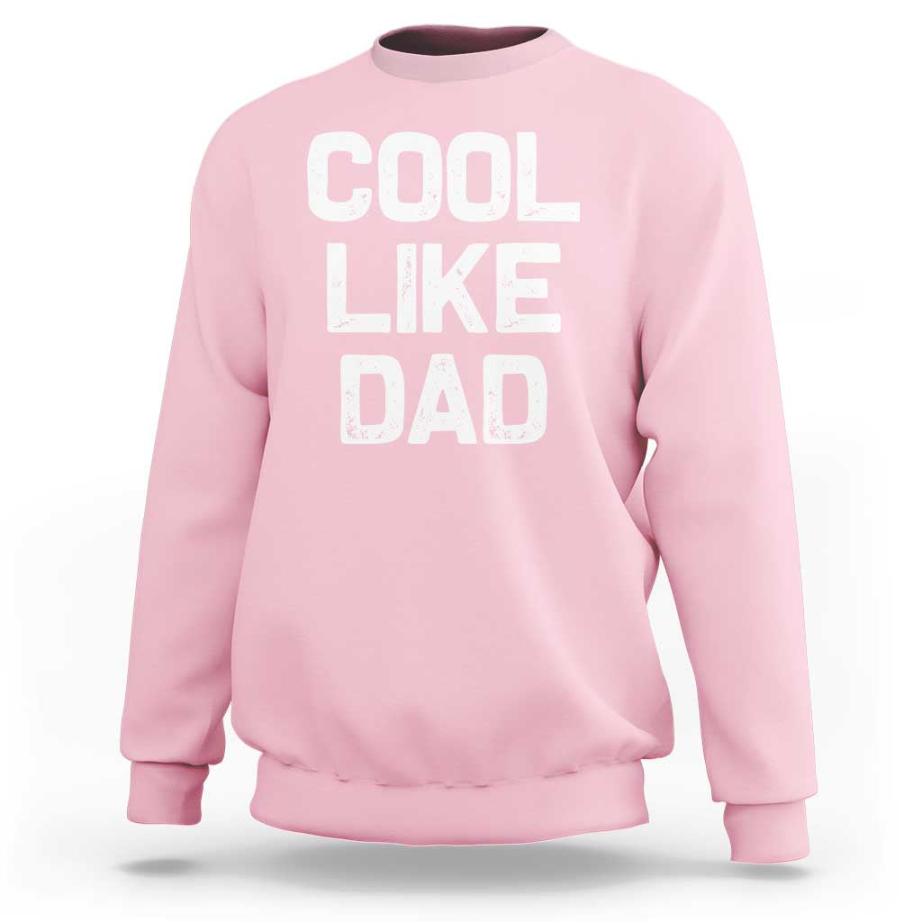 Light pink kids sweatshirt with "COOL LIKE DAD" graphic text on front