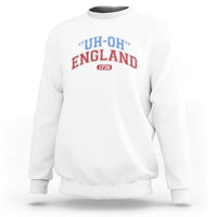 White crewneck sweatshirt with “UH-OH” “ENGLAND” and “1776” graphic on chest