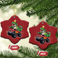 Set of two red snowflake-shaped dinosaur monster truck ornaments with hanging loops, front/back.