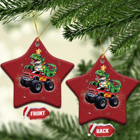 Set of two red star-shaped dinosaur monster truck Christmas ornaments with hanging loops, front/back.