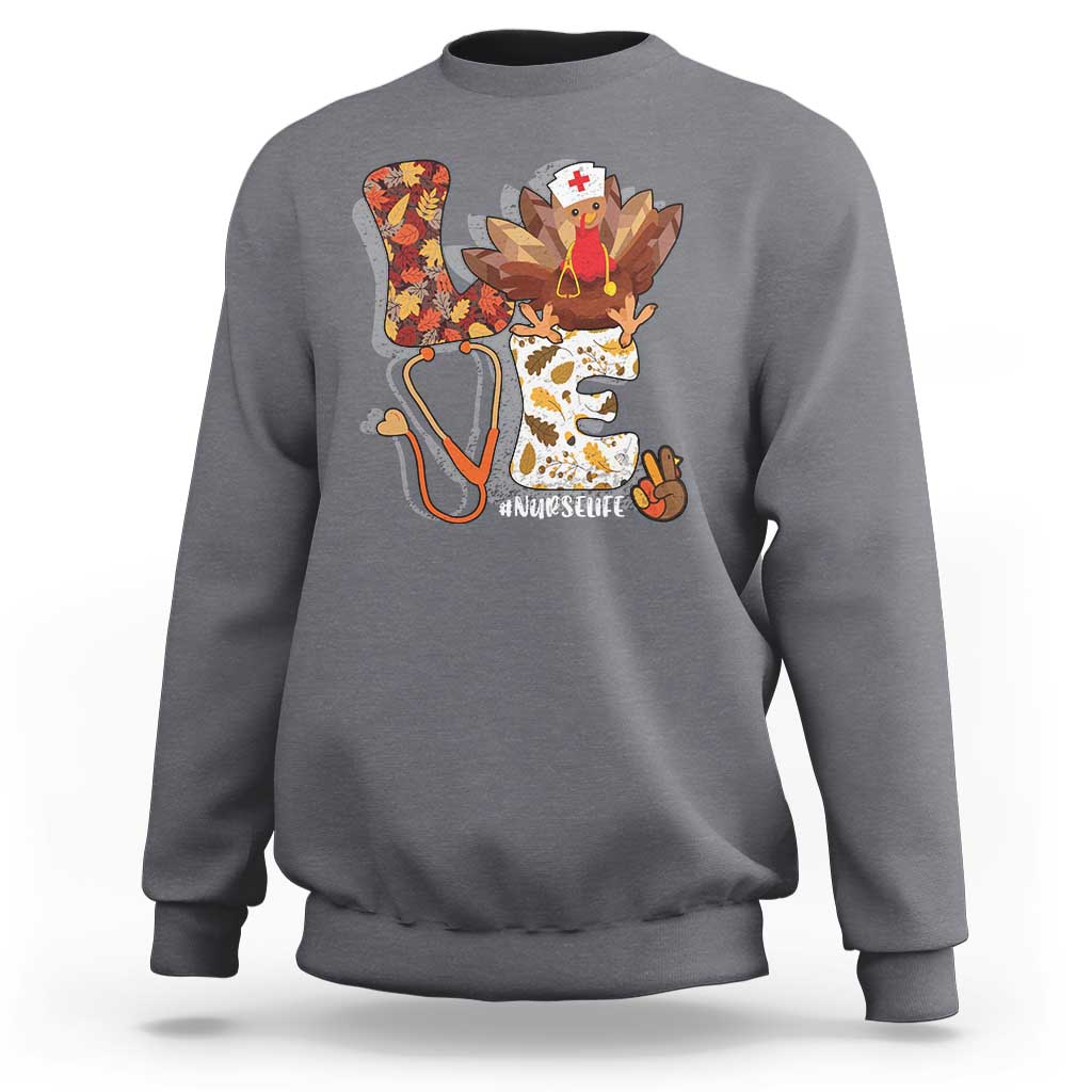 Medium gray sweatshirt with nurse-turkey autumn graphic on back
