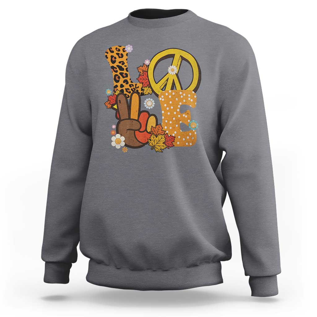 Light heather gray Thanksgiving sweatshirt with peace sign and turkey graphic, crew neck.