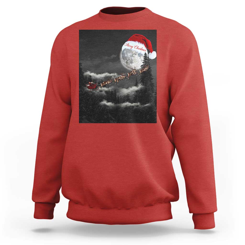 Red crewneck sweatshirt with moon-and-Santa graphic across the chest