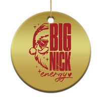Gold round Christmas ornament with red Santa graphic and text “BIG NICK energy”.