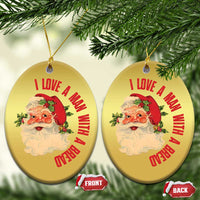 Two gold oval Santa Christmas ornaments with red love message and Santa portrait