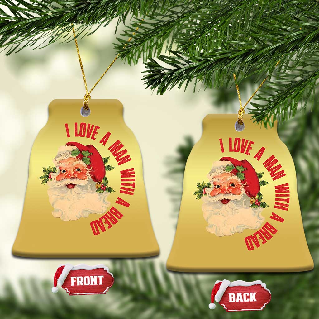 Pair of gold bell-shaped Santa Christmas ornaments with red love message; front and back shown
