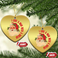 Two gold heart-shaped Santa Christmas ornaments with red love message and Santa portrait