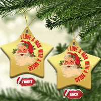 Two gold star-shaped Santa Christmas ornaments with red love message; front and back shown