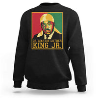 Black sweatshirt with “DR. MARTIN LUTHER KING JR.” graphic on the back