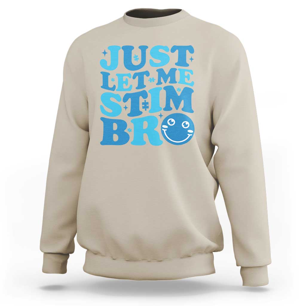 Beige crewneck sweatshirt with blue 'JUST LET ME STIM' graphic