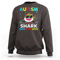 Dark chocolate crewneck sweatshirt with colorful AUTISM SHARK graphic on front