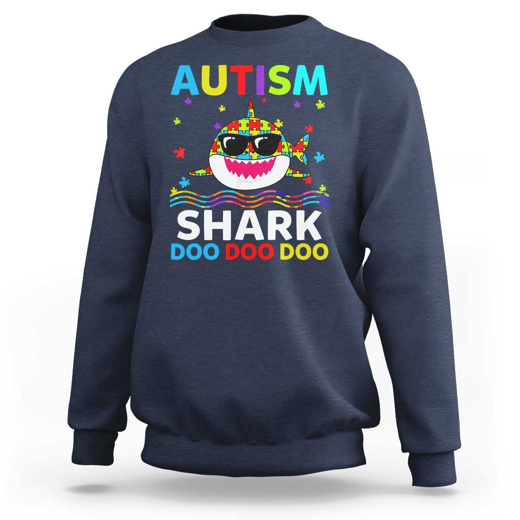 Navy crewneck sweatshirt with colorful AUTISM SHARK graphic on front