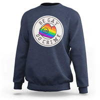 Navy crewneck sweatshirt with circular pride chameleon graphic on chest