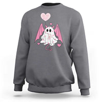 Gray crewneck sweatshirt with pink bat-winged ghost holding a heart and text