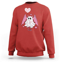 Red crewneck sweatshirt with pink bat-winged ghost graphic and heart text