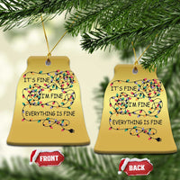 Gold bell-shaped Christmas ornaments (2) with multicolor string-light quote “It’s fine, I’m fine, everything is fine”.