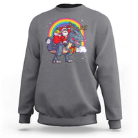 Charcoal gray crewneck sweatshirt with Santa riding a dinosaur-deer rainbow graphic