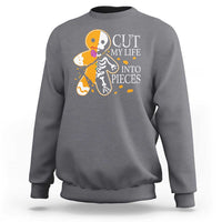 Charcoal gray crewneck sweatshirt with skull and guitars graphic and “CUT MY LIFE INTO PIECES”.