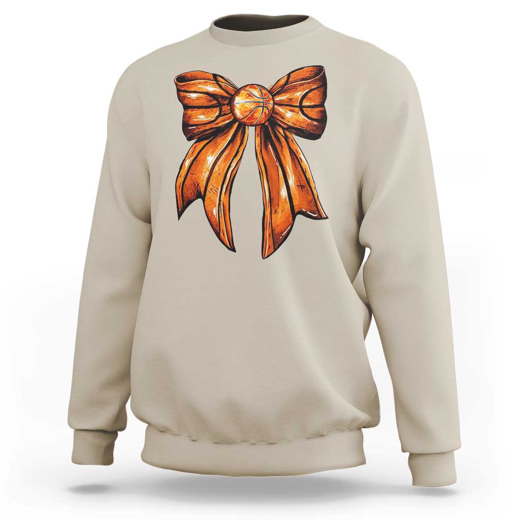 Sand crewneck sweatshirt with orange basketball bow graphic