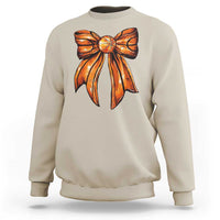 Sand crewneck sweatshirt with orange basketball bow graphic