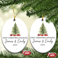 Two personalized oval Christmas ornaments hanging from gold strings with tree graphic and "2024"