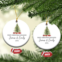 Two round personalized Christmas ornaments on tree branches with "James & Emily 2024"