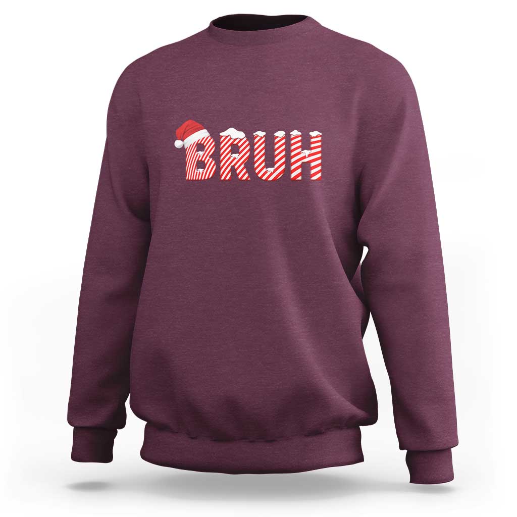 Maroon crewneck sweatshirt with 'BRUH' Christmas graphic in red-and-white stripes