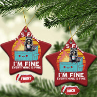 Two red star Christmas ornaments with raccoon holding noodle cup, “It’s Fine” meme text